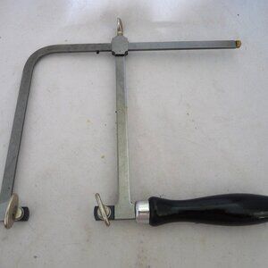 Euro Tool Germany adjustable saw cutting metal jewelry.
